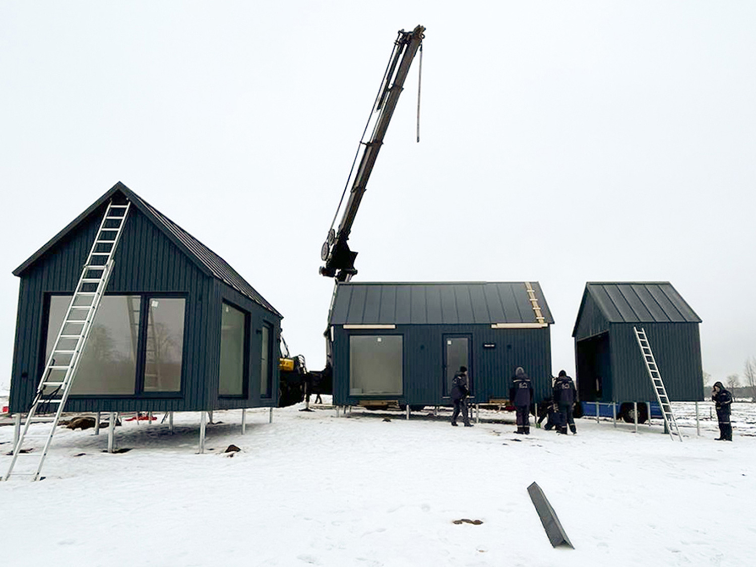A MyCabin home being lifted into place in 2021