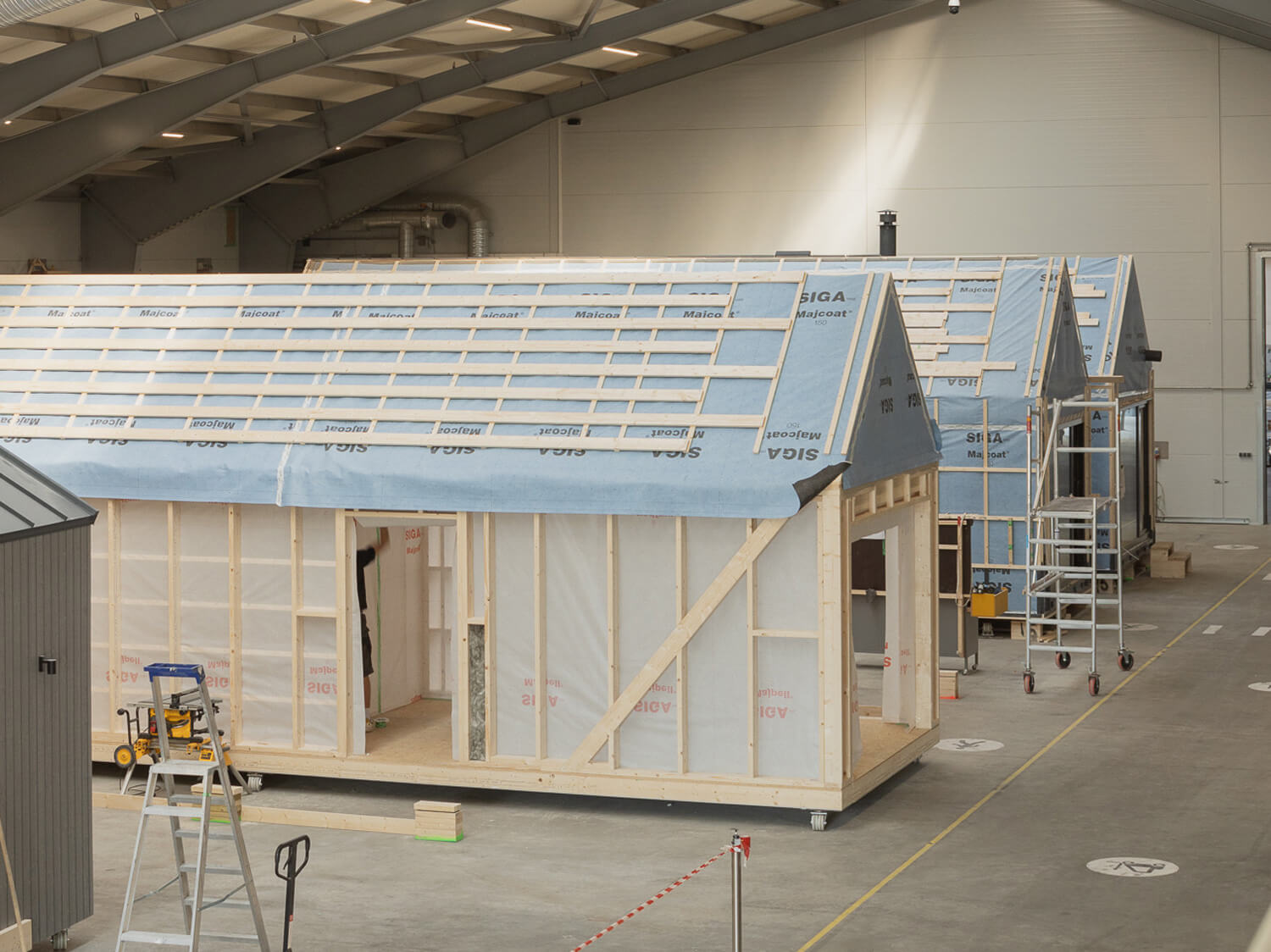 Homes under construction on the factory floor in 2026
