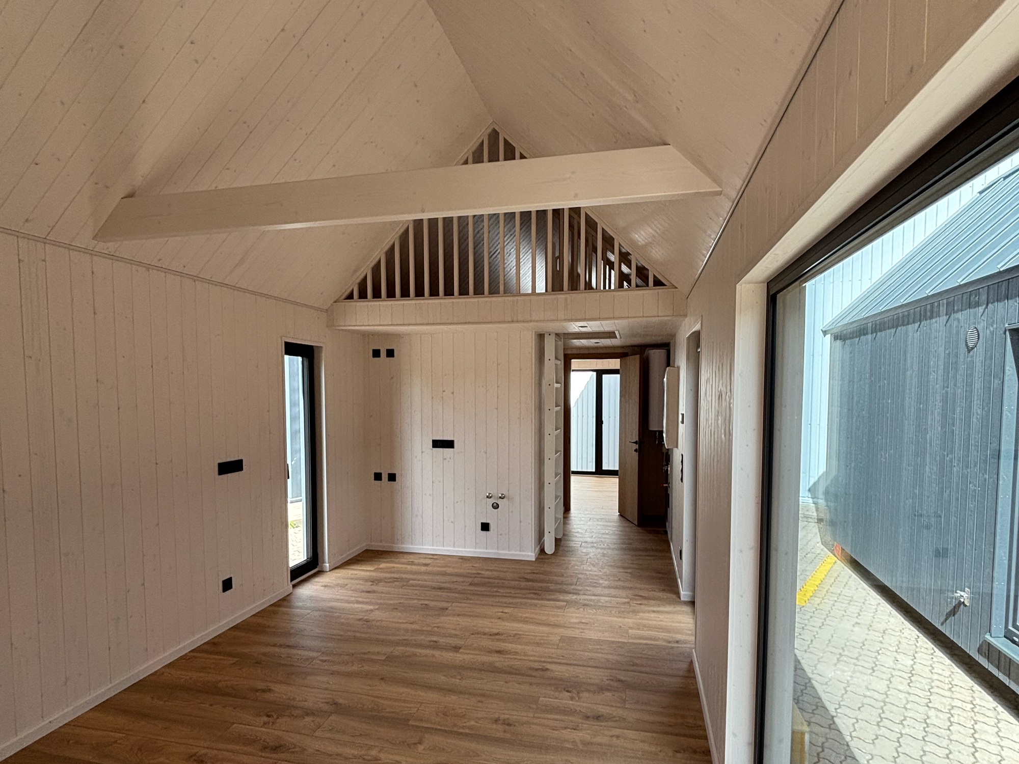 Living area inside a Milla 47, with the loft above