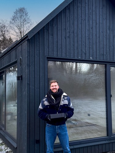 MyCabin homeowner outside their new home