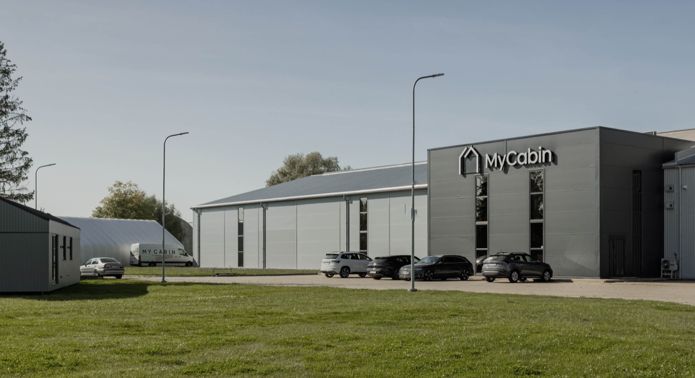Visitors touring the Milla 47 demo home at the Jelgava factory